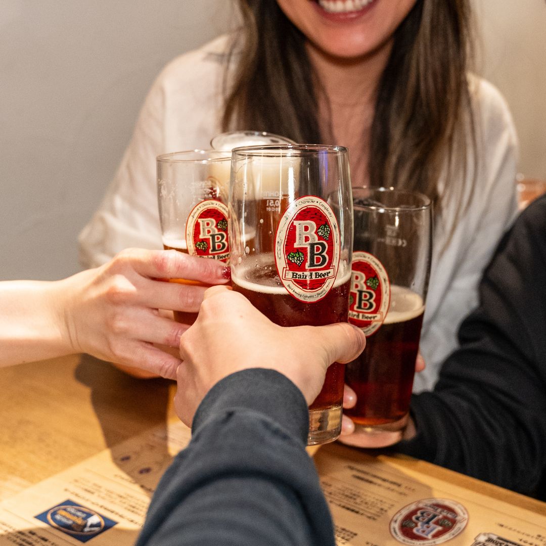 cheers with beer at Kichijoji Taproom